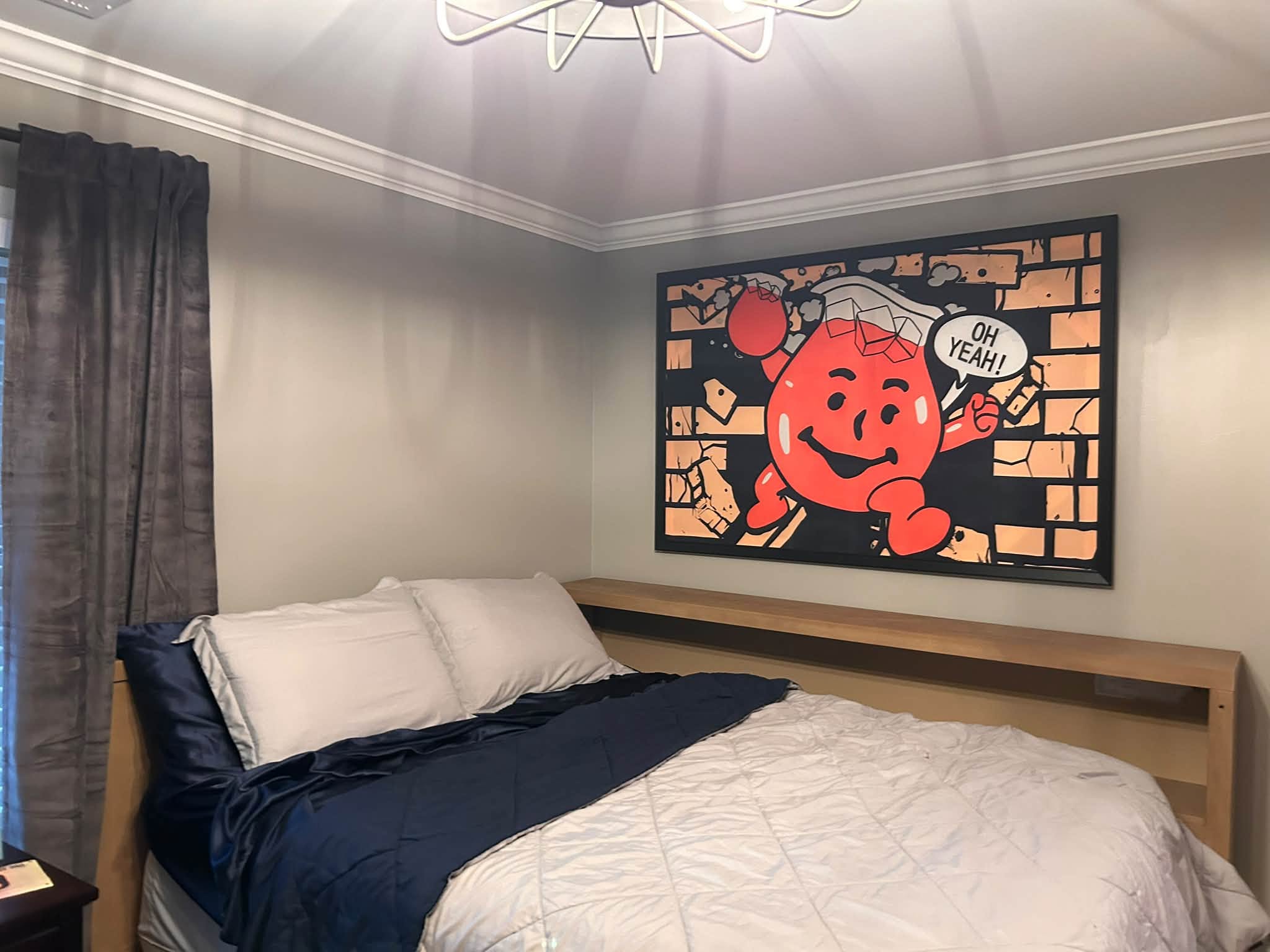 Bedroom refresh with carefully chosen art, textiles and styling